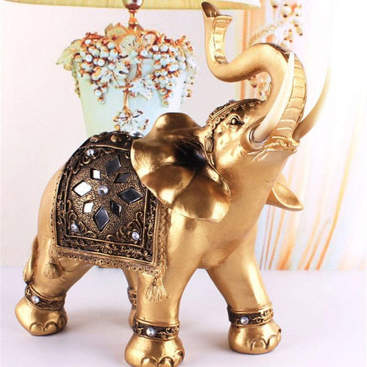 Statue d'éléphant en résine dorée Feng Shui - monespacechien.com