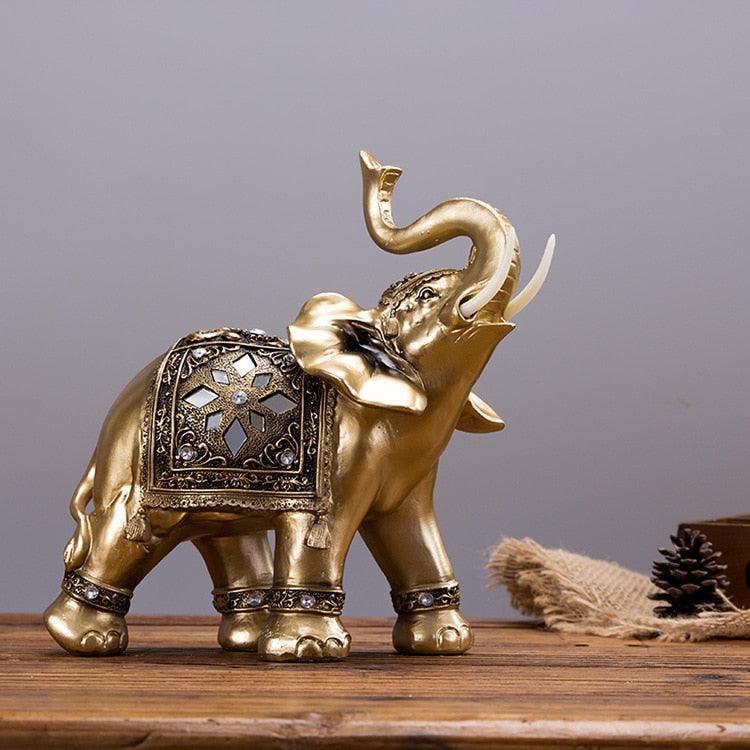 Statue d'éléphant en résine dorée Feng Shui - monespacechien.com